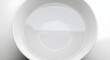 © Husein - Clear water in white bowl abstract minimalist design close up