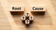© Pixel Stone - Root cause analysis concept with question marks on wooden dice and blocks
