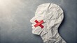 © Ramani - Crumpled Paper Head with Red X Tape – Censorship Symbol, Silenced Voice, Freedom of Expression, Suppression Concept, Abstract Profile, Social Commentary