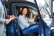 © Dragana Gordic - Confident Woman In Car With Salesperson During Vehicle Purchase Consultation At Dealership Showroom Today