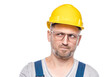 © Alen-D - Strict construction worker thinks. Portrait of doubtful repairman with confusion face expression, isolated on white background. Careful construction worker, copy space for text. Craftsman