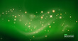 © mariaaverburg - Green christmas glitter background with stars. Festive glowing blurred texture.