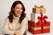 © Татьяна Евдокимова - Happy woman winking, smiling, and celebrating with a stack of colorful holiday presents for a special occasion