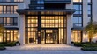 © Nurul - Luxury building entrance with glass doors & panels, limestone facade, & inviting glow at dusk