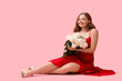 © Pixel-Shot - Beautiful young woman with bouquet of white roses on pink background