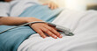 © Wess/peopleimages.com - Hands, child and oximeter in hospital bed to monitor pulse, blood pressure and surgery recovery. Closeup, kid and medical device to track oxygen, chronic condition and post operation of critical care