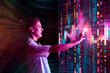 © Westend61 - Engineer analyzing data on digital screen in modern server room