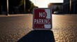© Bejo Studio - No Parking sign lays on street, sunlight
