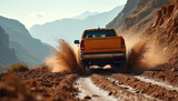 Orange pickup truck drives fast on rough dirt road kicking up brown mud spray. Rugged mountain terrain, dry rocky landscape create dusty motion blur effect. Adventure driving on challenging offroad