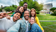 © Davide Angelini - Multicultural cheerful friends taking selfie pic with smart mobile phone device - Youth community people laughing at camera together - Friendship concept with guys and girls having fun outdoors