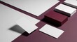 © MindRender - Flat lay of blank stationery items including business cards, paper, and boxes on a stylish maroon and white background, ideal for branding mockups