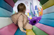© splitov27 - Little cute baby plays in a children's entertainment center