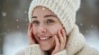 © Alex Pios - Joyful attractive young woman applying winter skin protection
