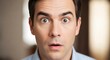 © Luan - A close up of a man with wide eyes and an open mouth showing a surprised or shocked expression on his face