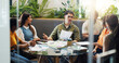 © peopleimages.com - Team, meeting and people with paperwork, creative brainstorming and marketing development graphs. Strategy, talk and group in office with campaign stats, collaboration or planning for business growth