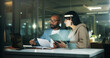 © Wess/peopleimages.com - Business, people and meeting with laptop at night for planning, finance report and review budget. Team, tech and brainstorming with documents, financial evaluation and working late for audit deadline