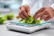 © Anastasiia Havelia - clinical dietitian measuring food portion size on smart scale, nutrition accuracy, bright clean background, close-up,