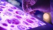 © Kullanat - Medical Research Hand with Petri Dish Under UV Light