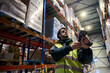 © alvaro - Warehouse worker scanning inventory in cold chain logistics