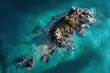© Surasak-Art - Aerial view of a rocky island surrounded by crystal-clear turquoise waters and gentle waves on a sunny day