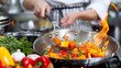 © Philipp - Dynamic action shot of a professional chef skillfully tossing vegetables in a pan with flames