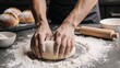 © Pixel Matrix - Baker preparing dough for fresh bread baking