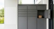© photoplotnikov - Modern outdoor parcel locker system with open compartment at contemporary building