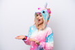 © luismolinero - Young Russian woman with unicorn pajamas isolated on white background with surprise facial expression