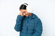 © luismolinero - Young hispanic woman wearing a winter earmuffs isolated on white background laughing