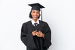 © luismolinero - Young university graduate African American woman isolated on white background sending a message with the mobile