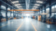 © janzwolinski - Industrial warehouse interior with machinery and equipment, blurred background