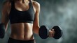 © Yuliia - Athletic woman with toned abs lifting dumbbell during workout against dramatic smoky background, showcasing strength and fitness determination.