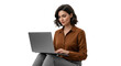 © Aka - Focused professional woman using laptop for remote work and productivity in modern attire with a neutral expression
