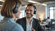 © DruZhi Art - Professional Customer Service Representative - Smiling Male Call Center Agent With Headset Talking To Female Colleague for Corporate Training, Business Communication, and Customer Support Illustration