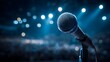 © Jojo* - Close up of a professional microphone on a stage with blue lighting for a live concert performance.