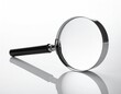 © Sinta - Magnifying Glass on White Background
