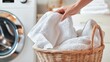 © Anna Shuliatieva - Elegant White Linen Basket Collection with Soft Comfort Towels and Textiles for Daily Hygiene Tasks