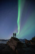© Pedro - Couple enjoying a night under the Northern Lights in Tromso, Norway