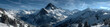 © john - large panorama sur une chaîne de montagne enneigées des Alpes suisses