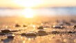 © Hanania Project - Close up photo of sand and pebbles with sparkling light and bokeh effects