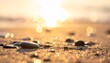 © Hanania Project - Close up photo of sand and pebbles with sparkling light and bokeh effects