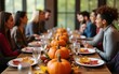 © ling - Group gathered around pumpkin-filled table with fall decorations, suitable for harvest-themed event or seasonal celebration. High quality