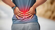 © REXSONA - Man suffering from backpain with his hands highlighted in red due to injury feeling ache suffering painful for medical