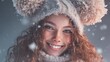 © Johannes - joyful young woman with whimsical pompom ears exuding festive winter warmth reminiscent of whimsical scandinavian jul celebrations 2026