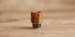 © vxnaghiyev - The drip tip 810 on an electronic cigarette, designed for user comfort, emphasizes ergonomic functionality