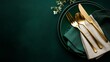 © Harry - Elegant dark green table setting with luxurious gold cutlery and subtle foliage accents creates a sophisticated dining atmosphere for special occasions