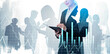 © ImageFlow - Silhouettes of business people working together, double exposure style, on a city background with financial graphs, symbolizing teamwork and strategy