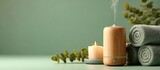 Essential oil diffuser aromatherapy spa wellness relaxation zen candle towels leaf
