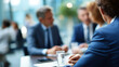 © Kateryna - Collective of corporate professionals in productive discussion at conference faceless business people defocused meeting room background collaborative conversation scene