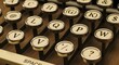 © Indri - Classic Vintage Typewriter Keys Close-Up Detail perfect for Editorial content, blog headers, historical articles, writer's website, book cover,